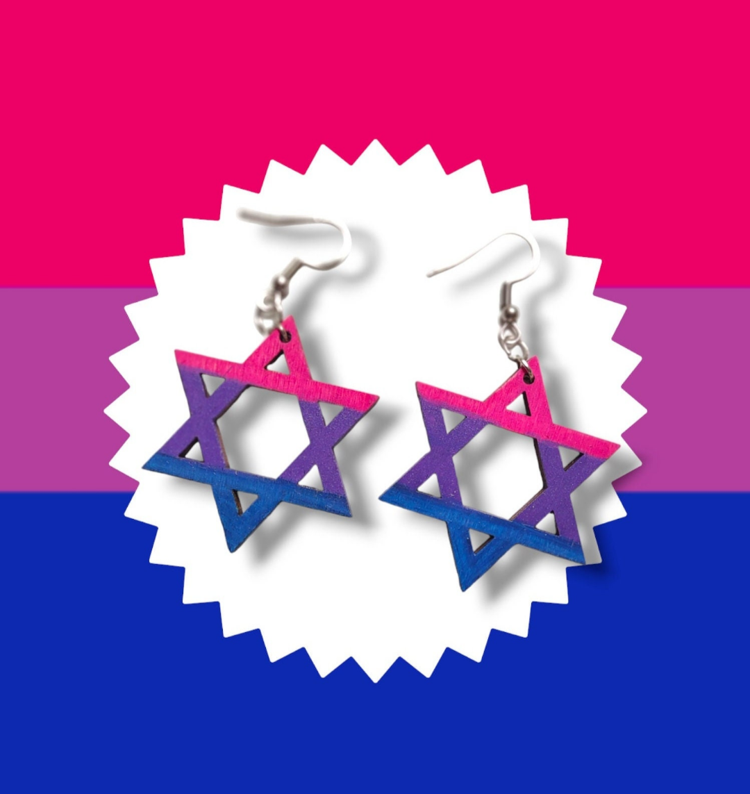 Star-shaped earrings on a colorful background